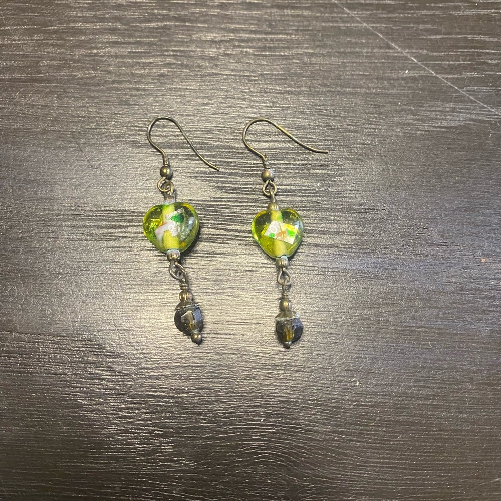 Green foiled glass heart shaped bead dangle earrings